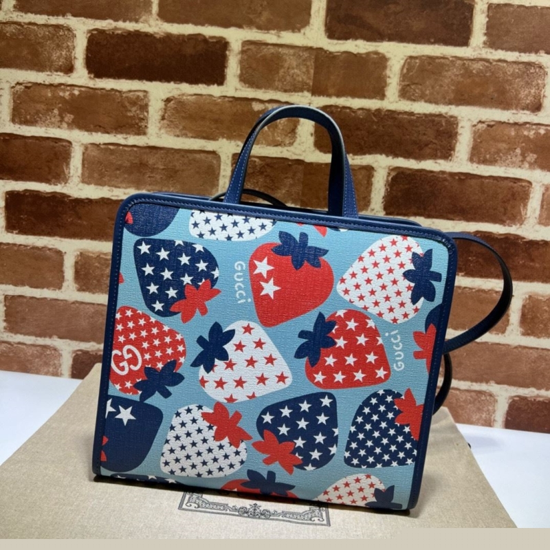 G*u*i shopping bags